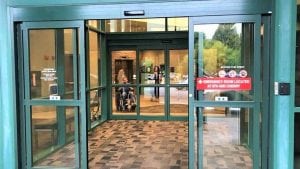 Glass aluminum commercial vestibule installed by Automatic Door Doctors